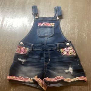 Two pairs girls overalls